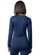 Person wearing a navy long-sleeve top and pants on a white background