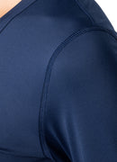 Close-up of a navy blue athletic shirt with a white background